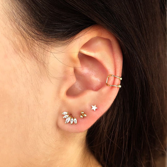 Piercing triangle 3 billes ,OR 18K. - PARADOXE