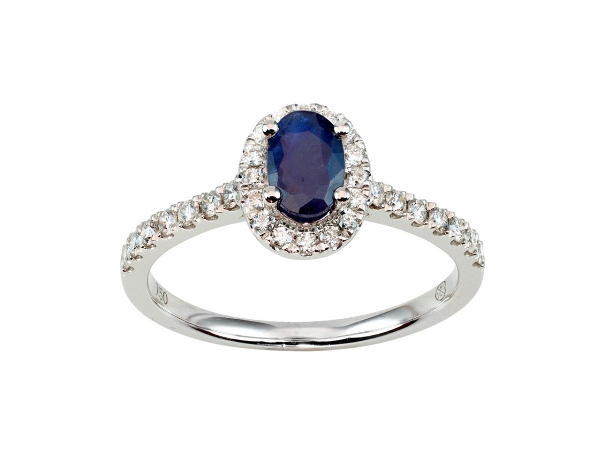 Solitaire saphir bleu ovale 0,57ct entourage diamants 0,28ct , Or gris 18K - PARADOXE